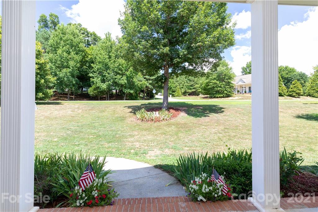 733 Flamingo Road Clover, SC 29710 - Photo 41 of 48 a view of a garden with a fountain