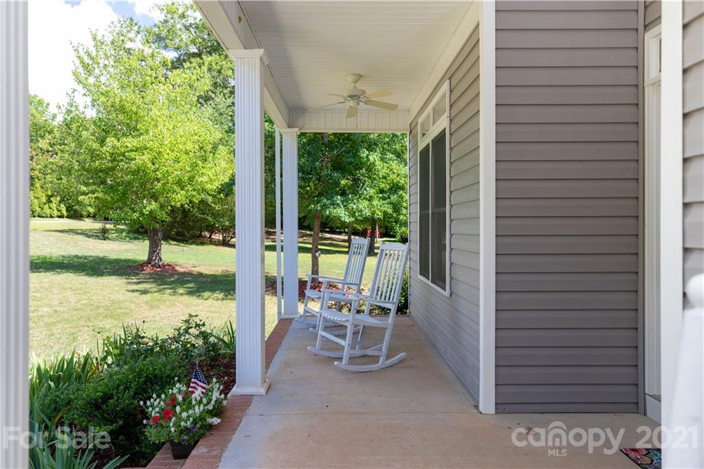 733 Flamingo Road Clover, SC 29710 - Photo 42 of 48 a view of a porch with furniture and garden