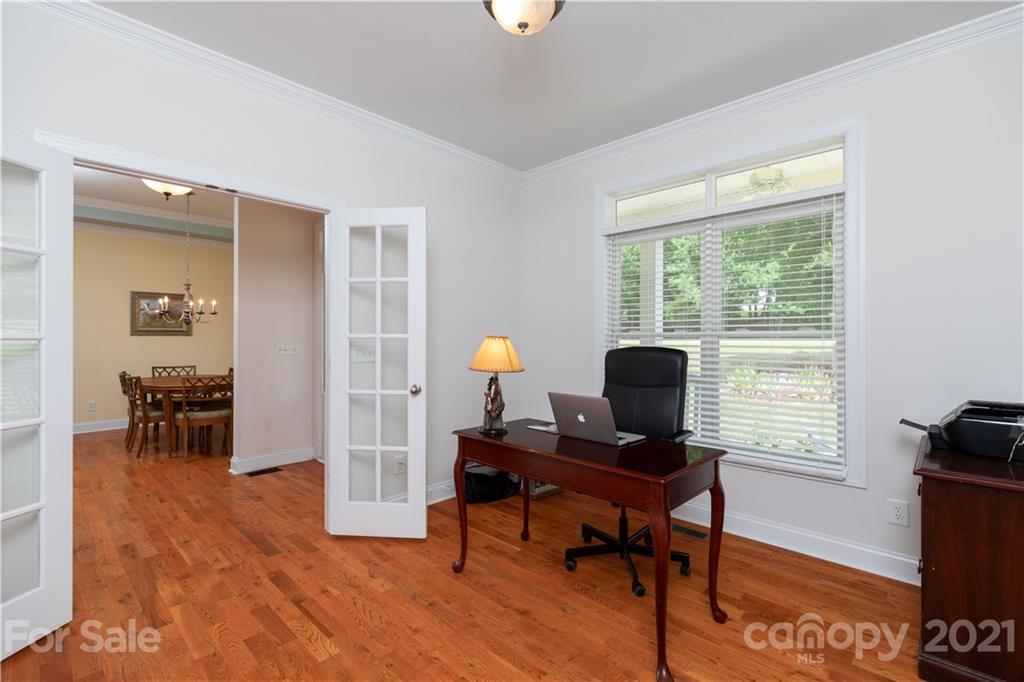 733 Flamingo Road Clover, SC 29710 - Photo 7 of 48 a workspace with furniture and a window
