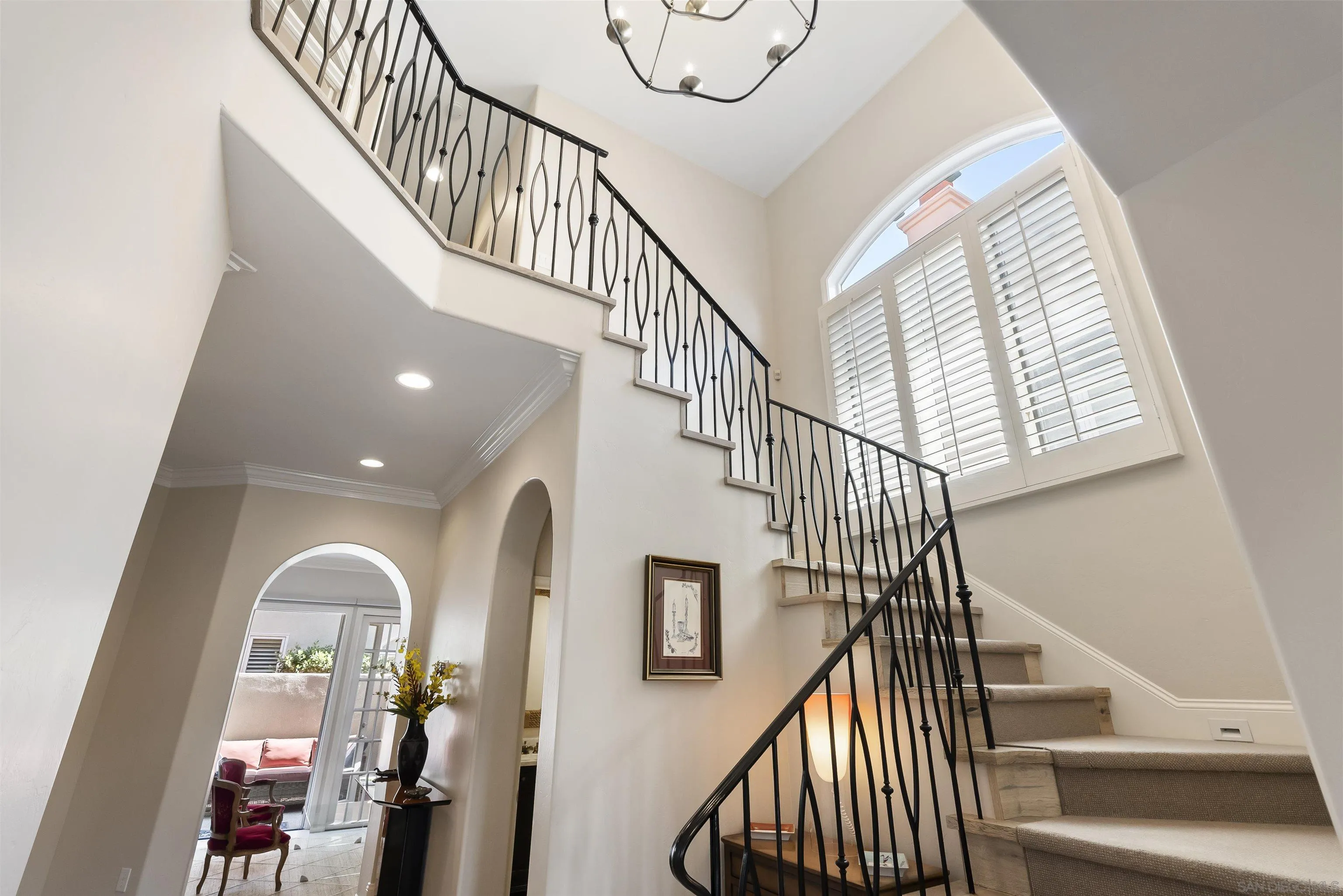 7715 Ivanhoe Avenue La Jolla, CA 92037 - Photo 15 of 28 a view of entryway and hall with wooden floor