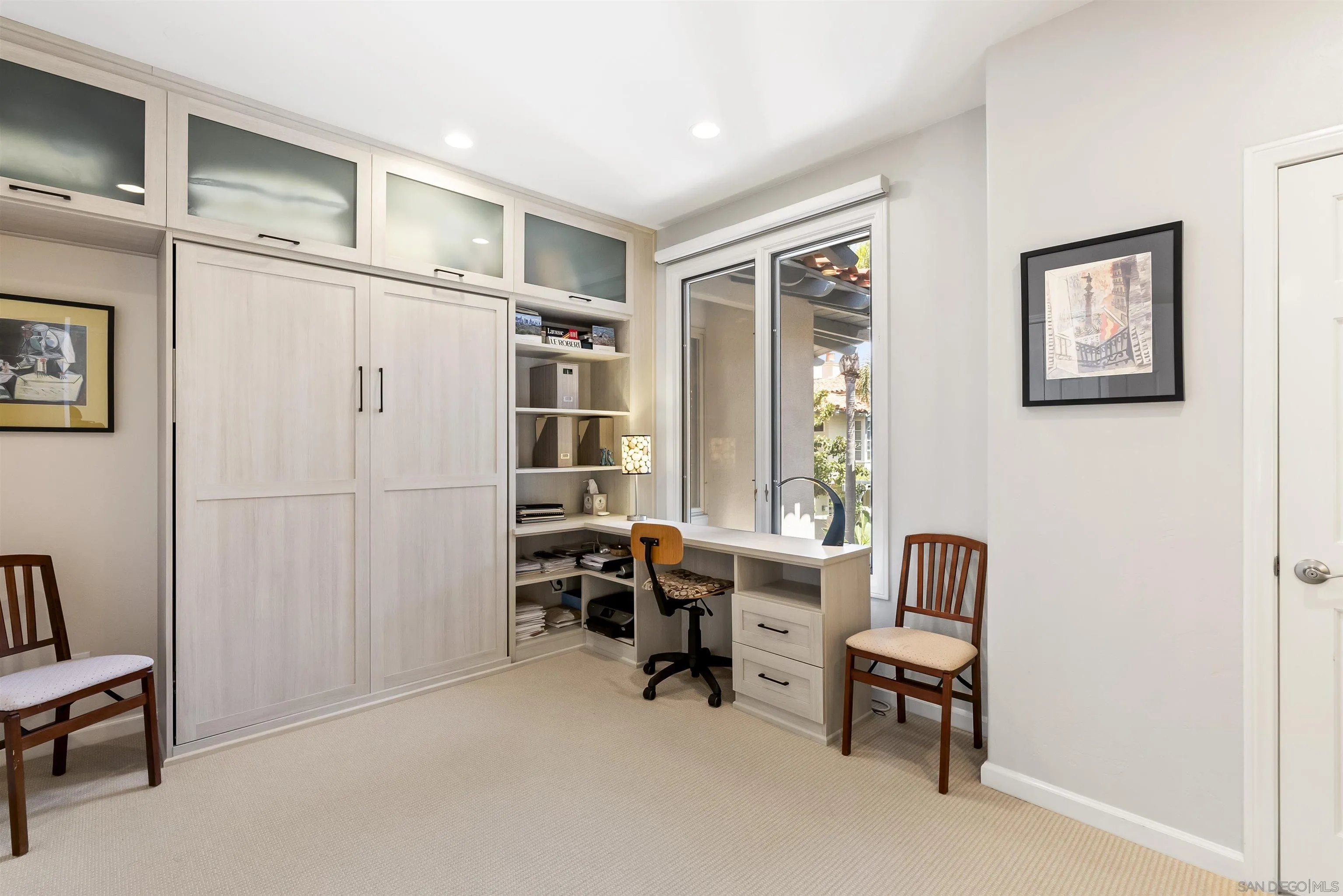7715 Ivanhoe Avenue La Jolla, CA 92037 - Photo 25 of 28 a view of a livingroom with furniture and a window