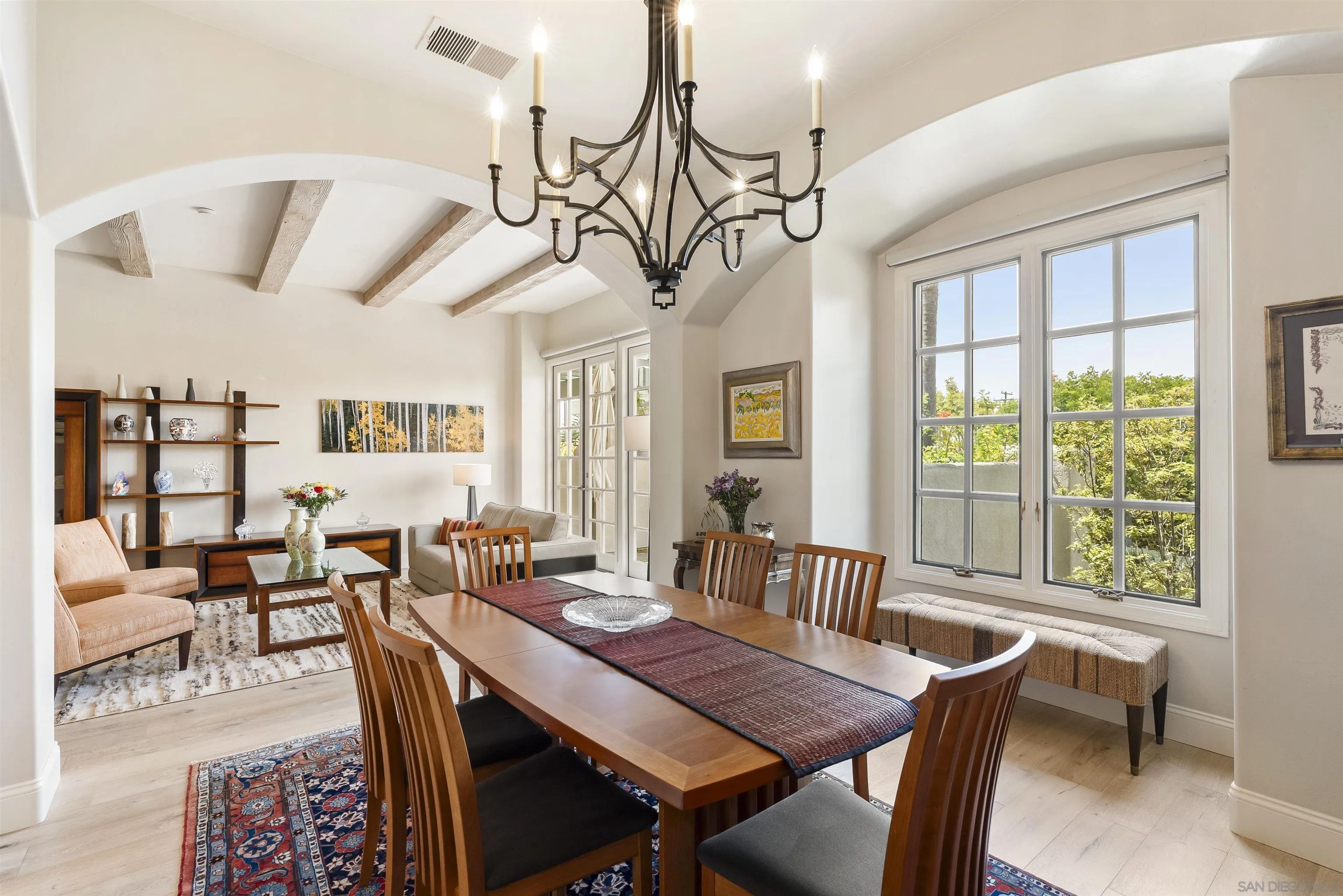 7715 Ivanhoe Avenue La Jolla, CA 92037 - Photo 4 of 28 a view of a dining room with furniture window and outside view