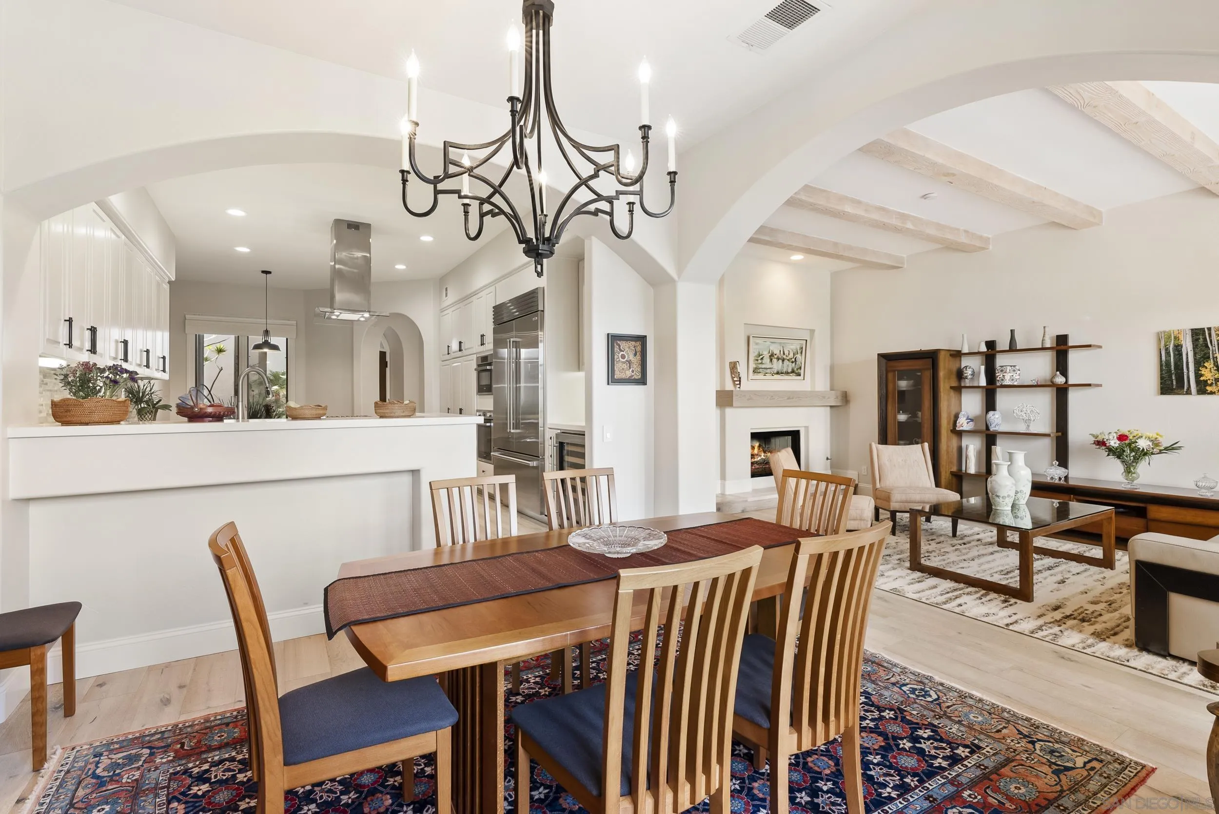 7715 Ivanhoe Avenue La Jolla, CA 92037 - Photo 5 of 28 a view of a dining room with furniture