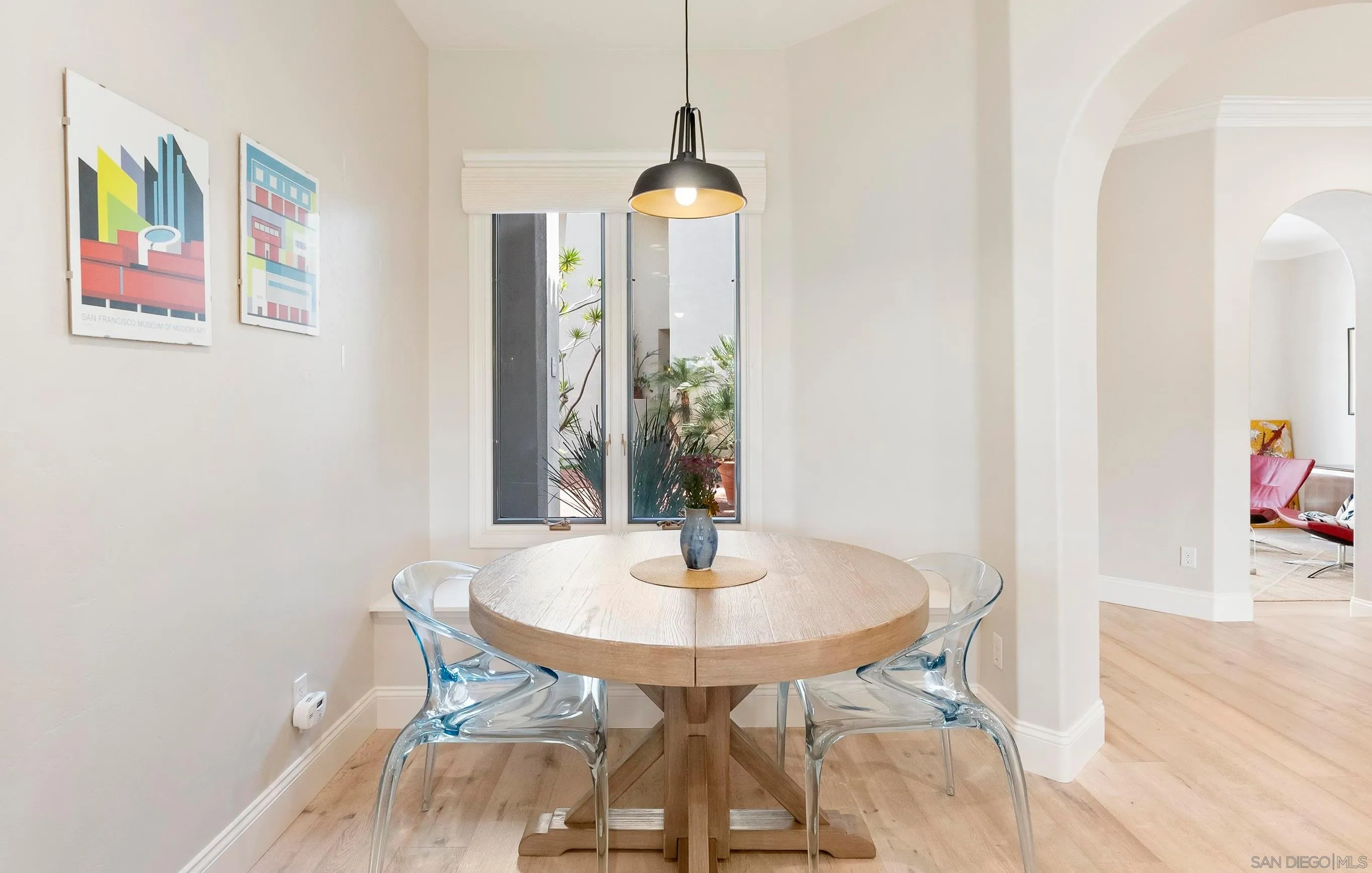 7715 Ivanhoe Avenue La Jolla, CA 92037 - Photo 9 of 28 a dining room with furniture and window