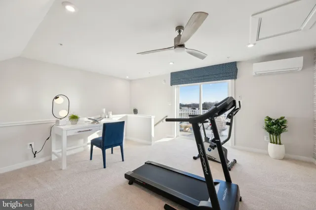 a view of a workspace with furniture