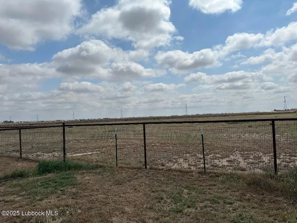 a view of outdoor space and iron fence