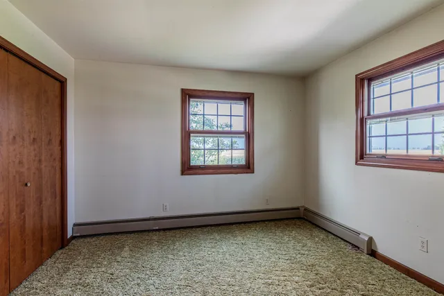 a view of a room with a window