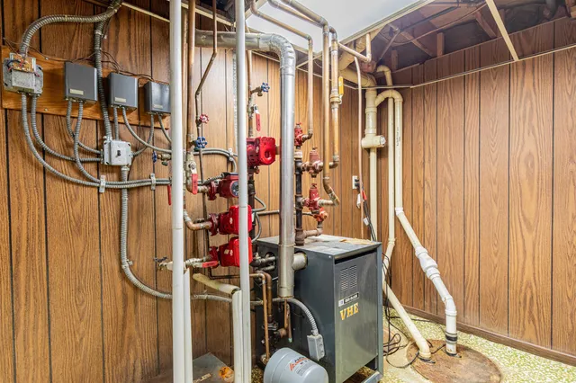 a view of walk in closet with clothes