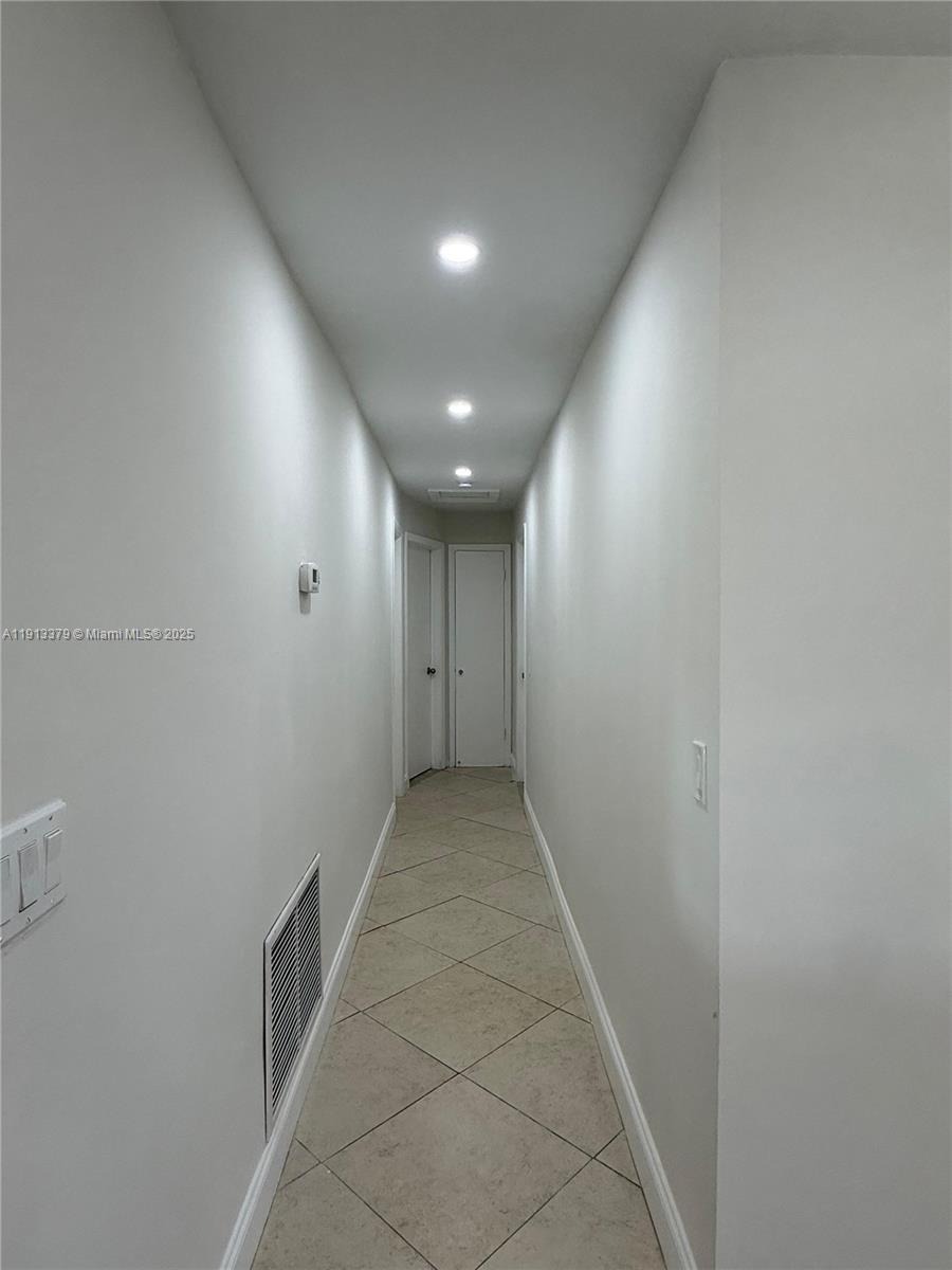 601 Southwest 10th Street Delray Beach, FL 33444 - Photo 11 of 17 a view of hallway