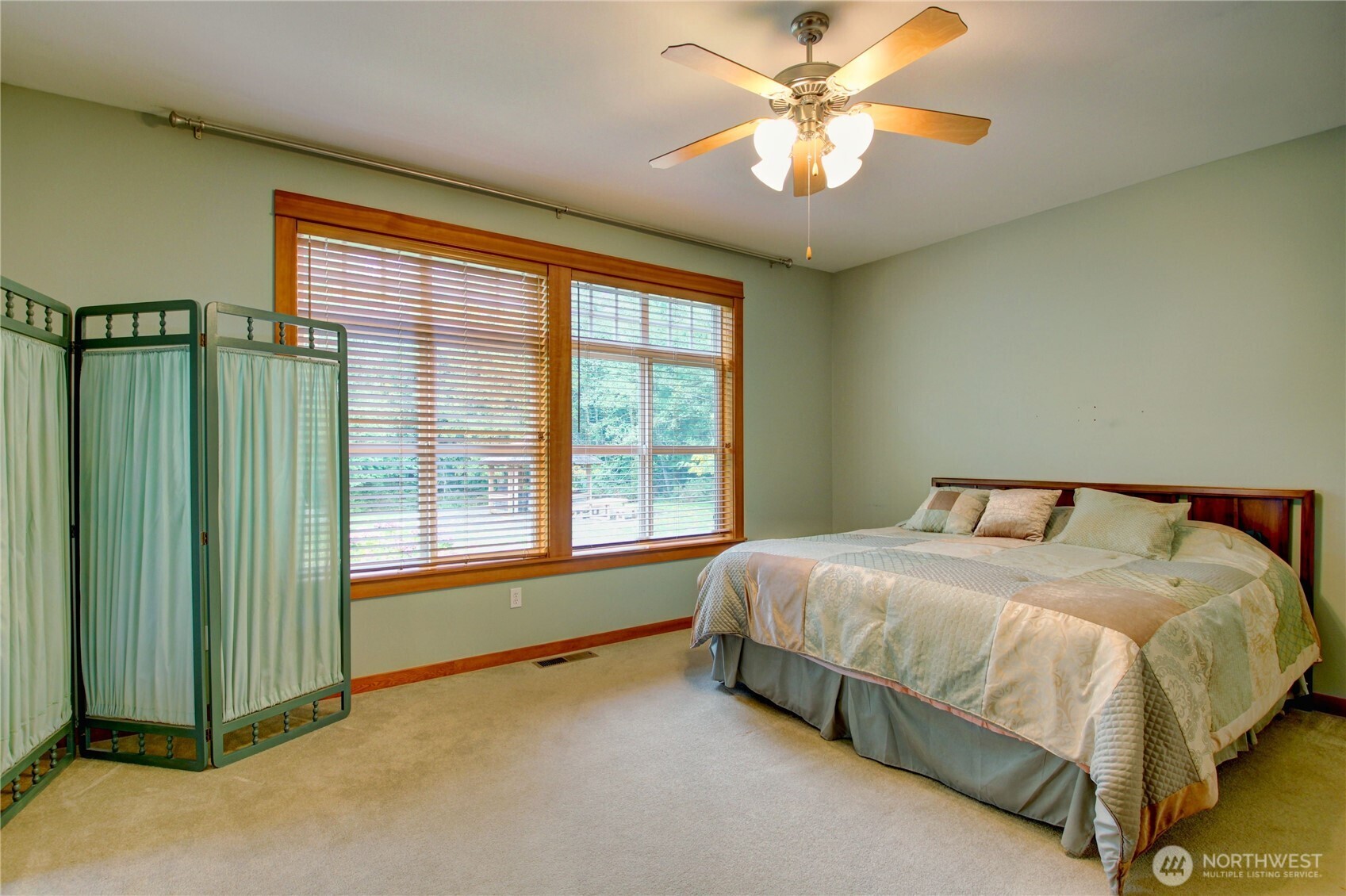 1316 Eagle Ridge Drive, Unit 4 Mount Vernon, WA 98274 - Photo 18 of 29 a bed sitting in a spacious bedroom next to a window