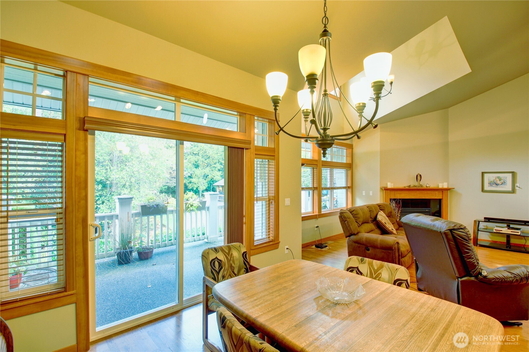 1316 Eagle Ridge Drive, Unit 4 Mount Vernon, WA 98274 - Photo 23 of 29 a view of a dining room with furniture wooden floor and chandelier