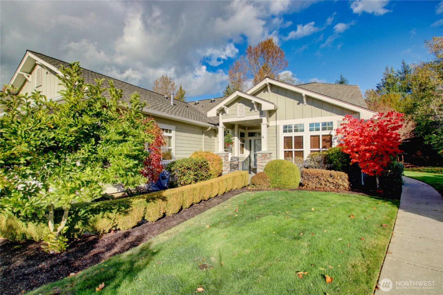 1316 Eagle Ridge Drive, Unit 4 Mount Vernon, WA 98274 - Photo 3 of 29 a front view of a house with a yard