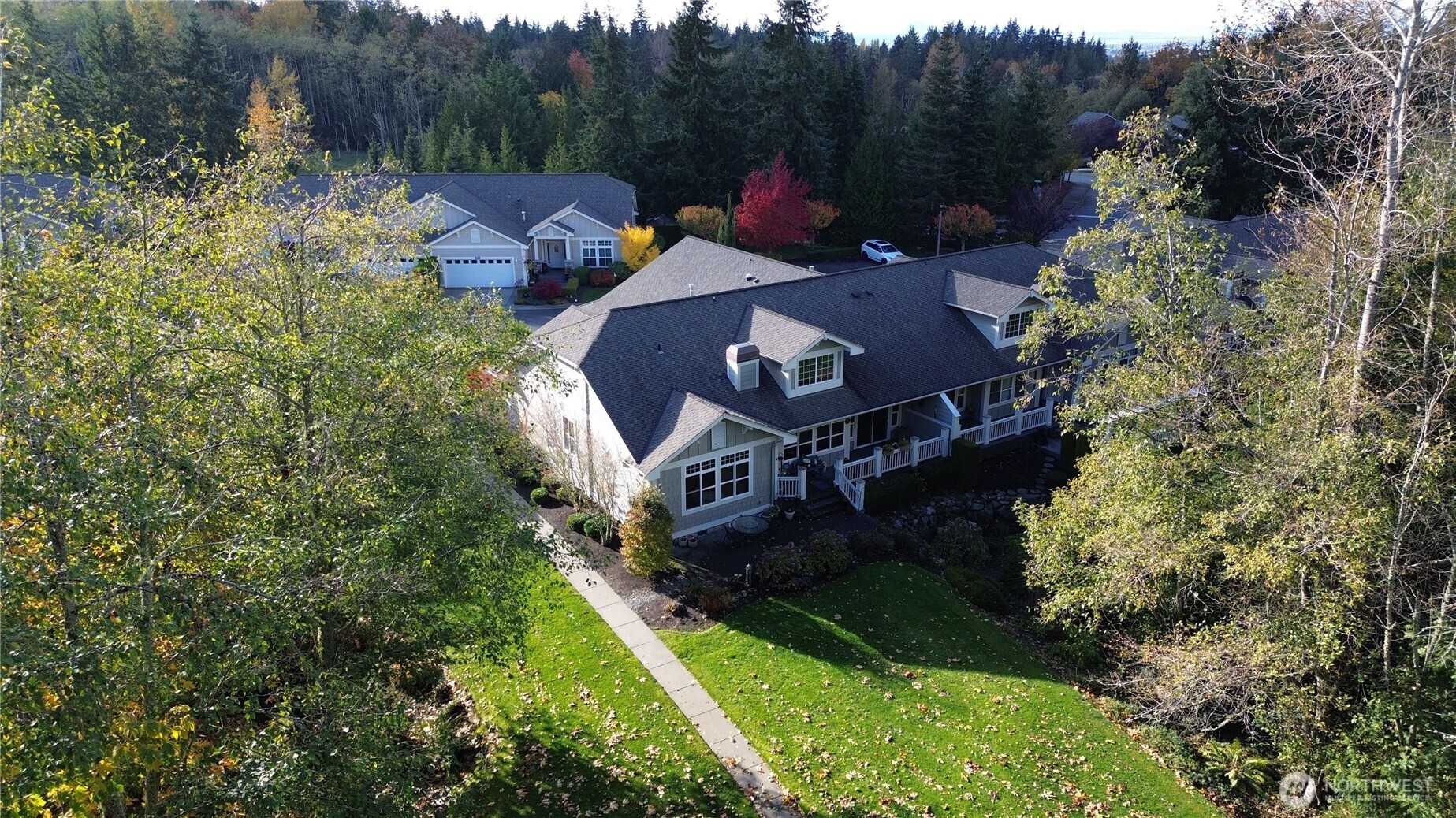 1316 Eagle Ridge Drive, Unit 4 Mount Vernon, WA 98274 - Photo 5 of 29 a aerial view of a house with yard swimming pool and outdoor seating