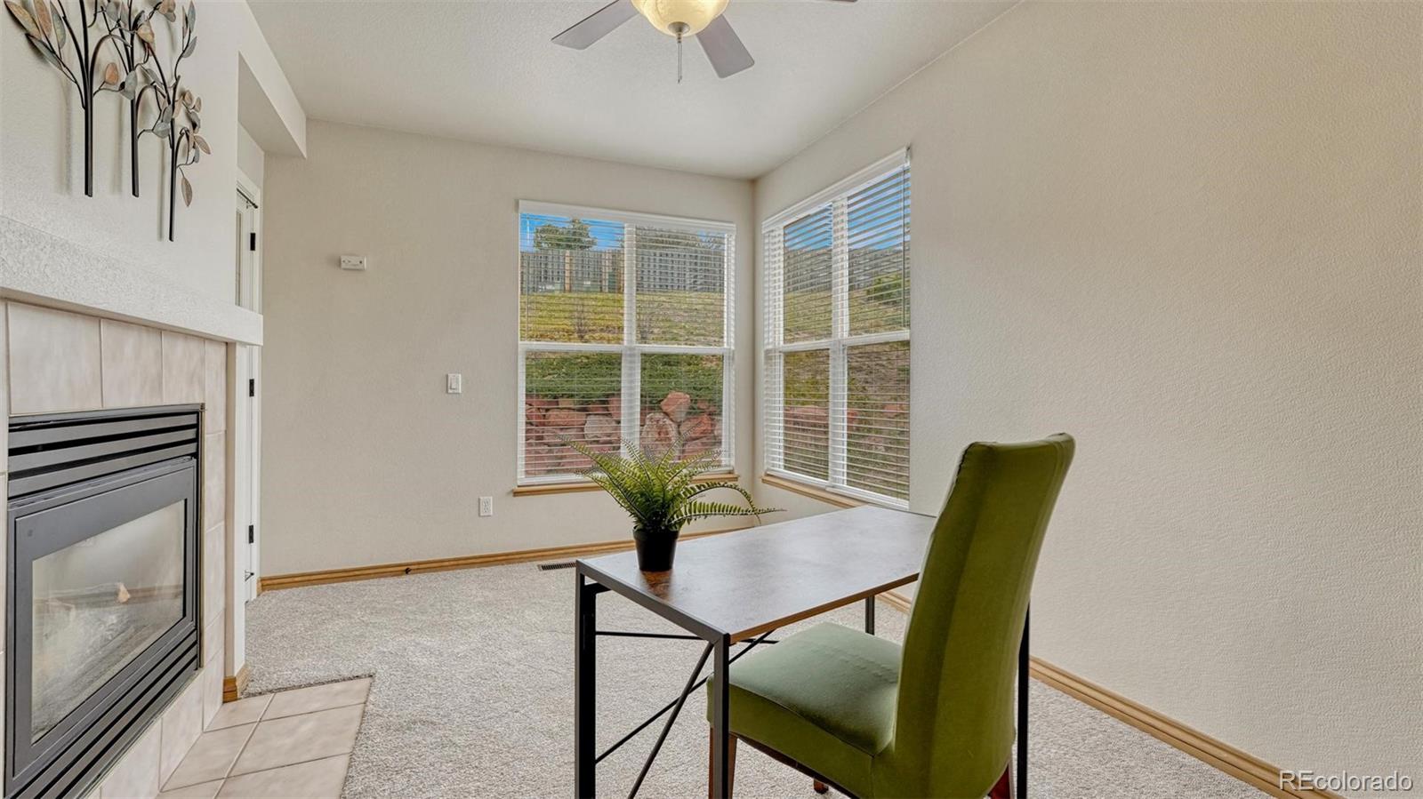 15211 Ridgefield Lane Colorado Springs, CO 80921 - Photo 17 of 47 a view of a workspace with furniture