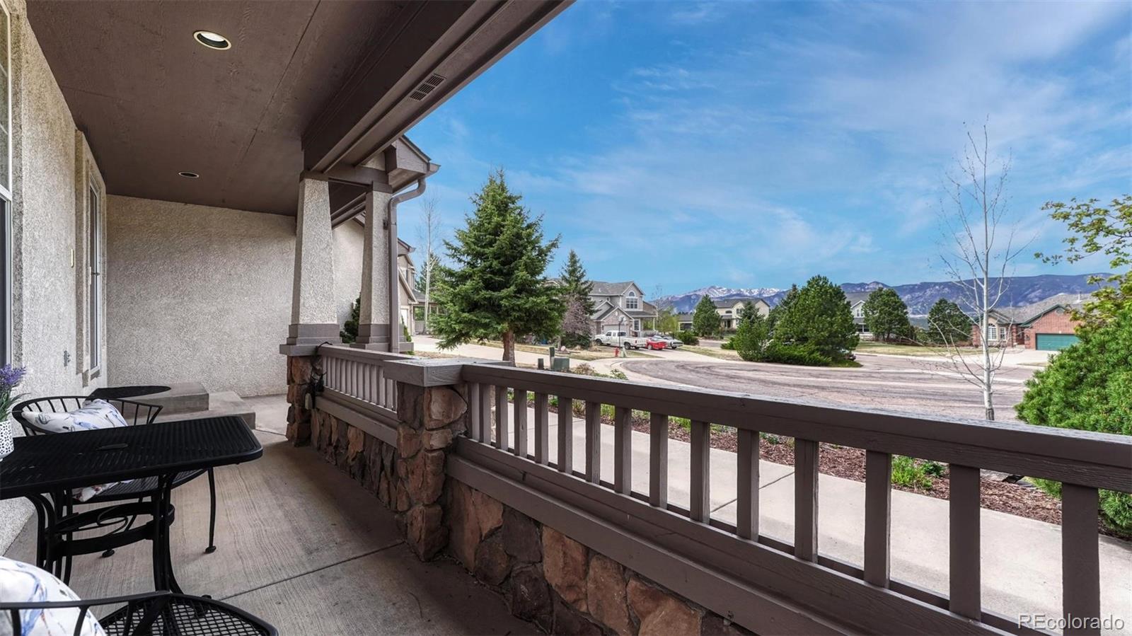 15211 Ridgefield Lane Colorado Springs, CO 80921 - Photo 3 of 47 a view of a balcony with chairs