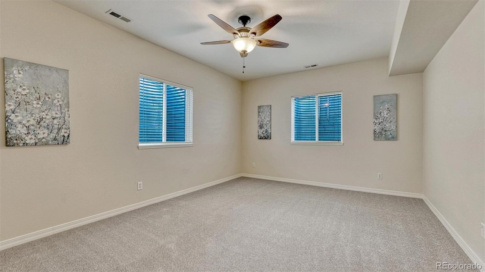 15211 Ridgefield Lane Colorado Springs, CO 80921 - Photo 36 of 47 a view of an empty room with a window