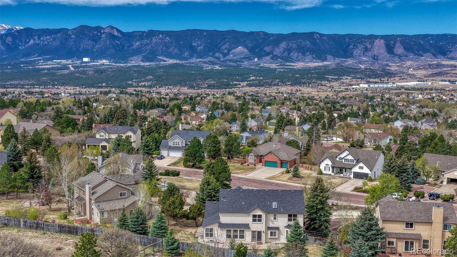 15211 Ridgefield Lane Colorado Springs, CO 80921 - Photo 40 of 47 an aerial view of residential houses with outdoor space
