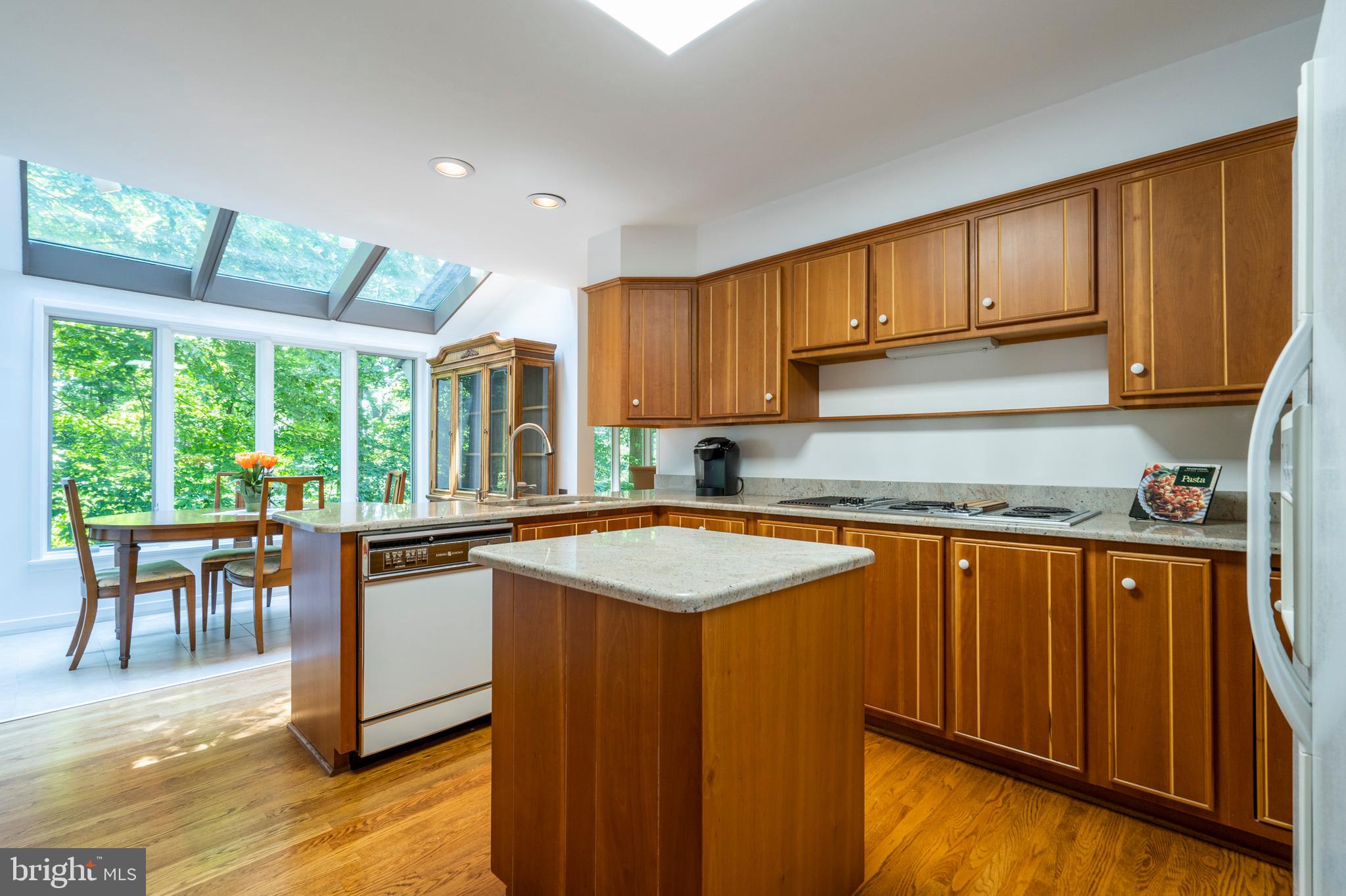 309 Valley Place Radnor, PA 19087 - Photo 13 of 39 a kitchen with stainless steel appliances granite countertop sink stove top oven and cabinets