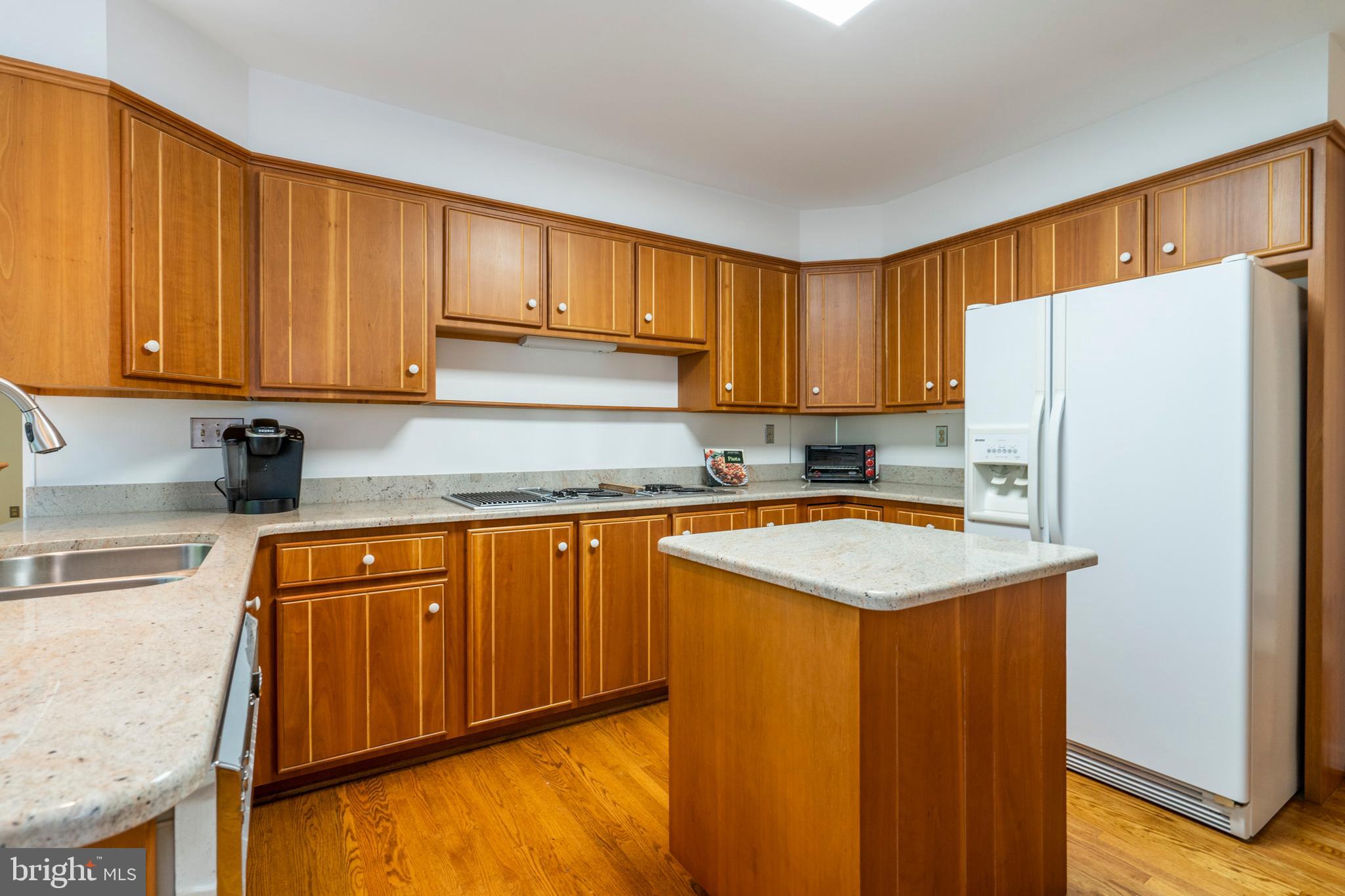 309 Valley Place Radnor, PA 19087 - Photo 15 of 39 a kitchen with stainless steel appliances granite countertop a refrigerator sink and cabinets