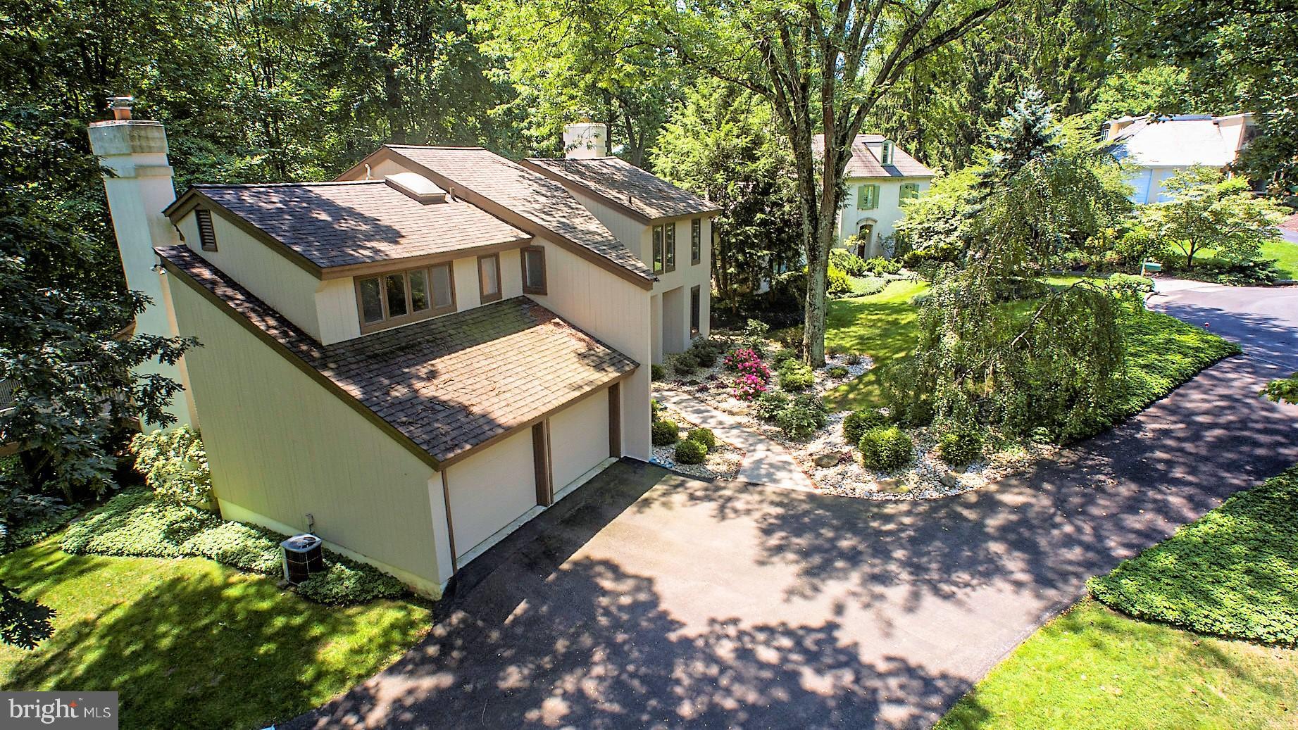 309 Valley Place Radnor, PA 19087 - Photo 3 of 39 a view of a house with a yard and large trees