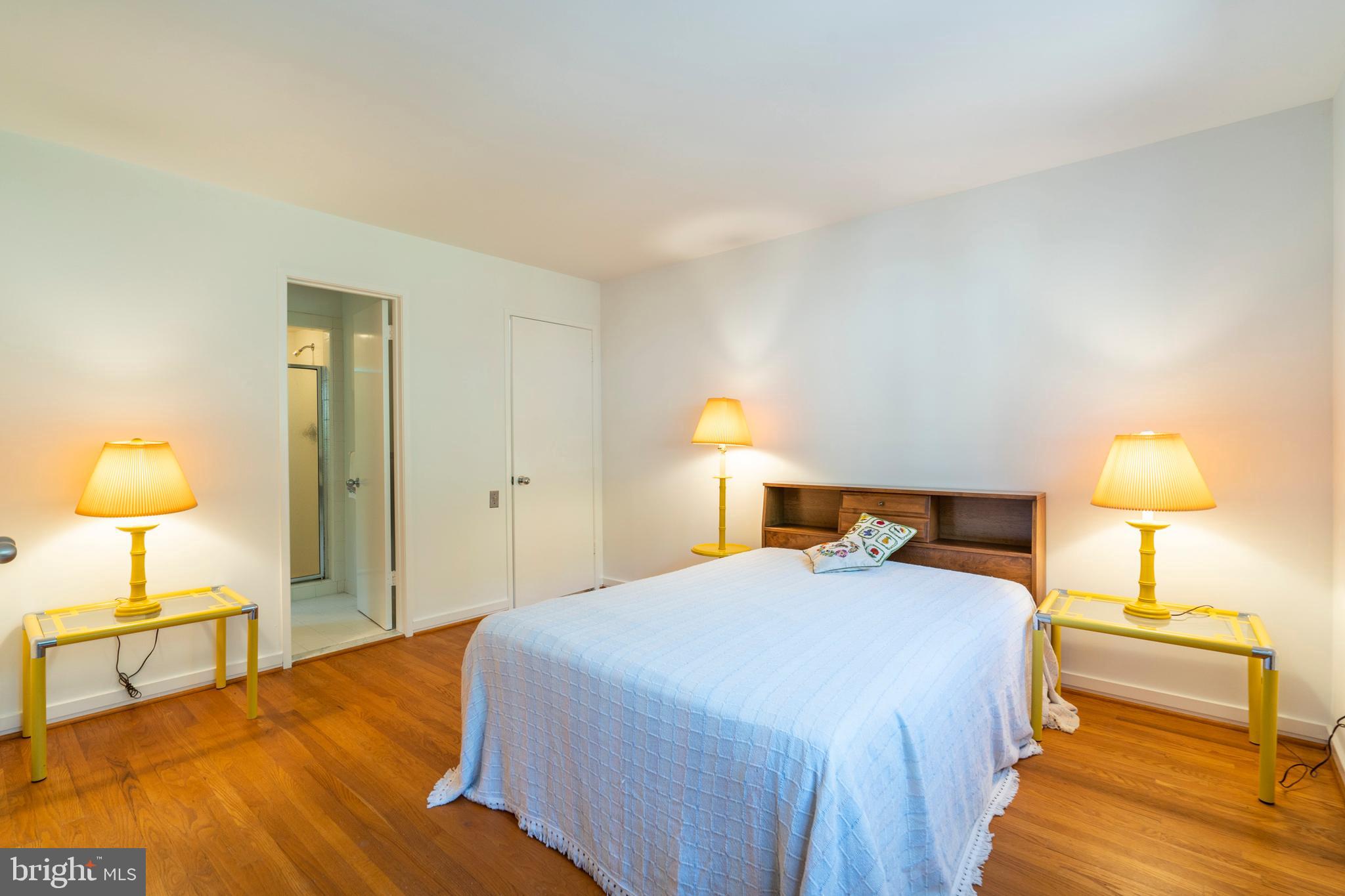 309 Valley Place Radnor, PA 19087 - Photo 34 of 39 a bedroom with a bed and a lamp