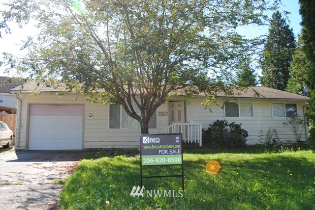 3317 Northeast 17th Street Renton, WA 98056 - Photo 1 of 1 front view of a house with a yard