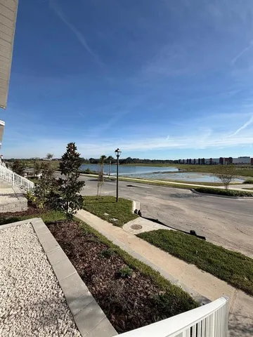 a view of a lake with a outdoor space
