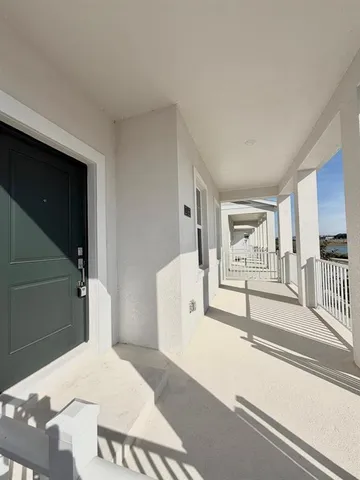a bedroom with a bed and a cabinets