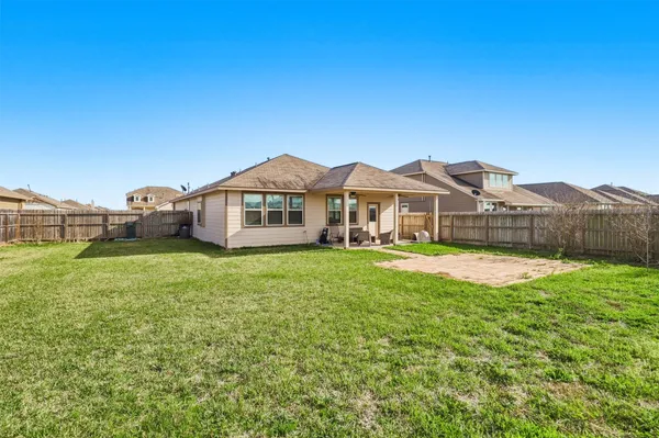 a view of a house with a big yard