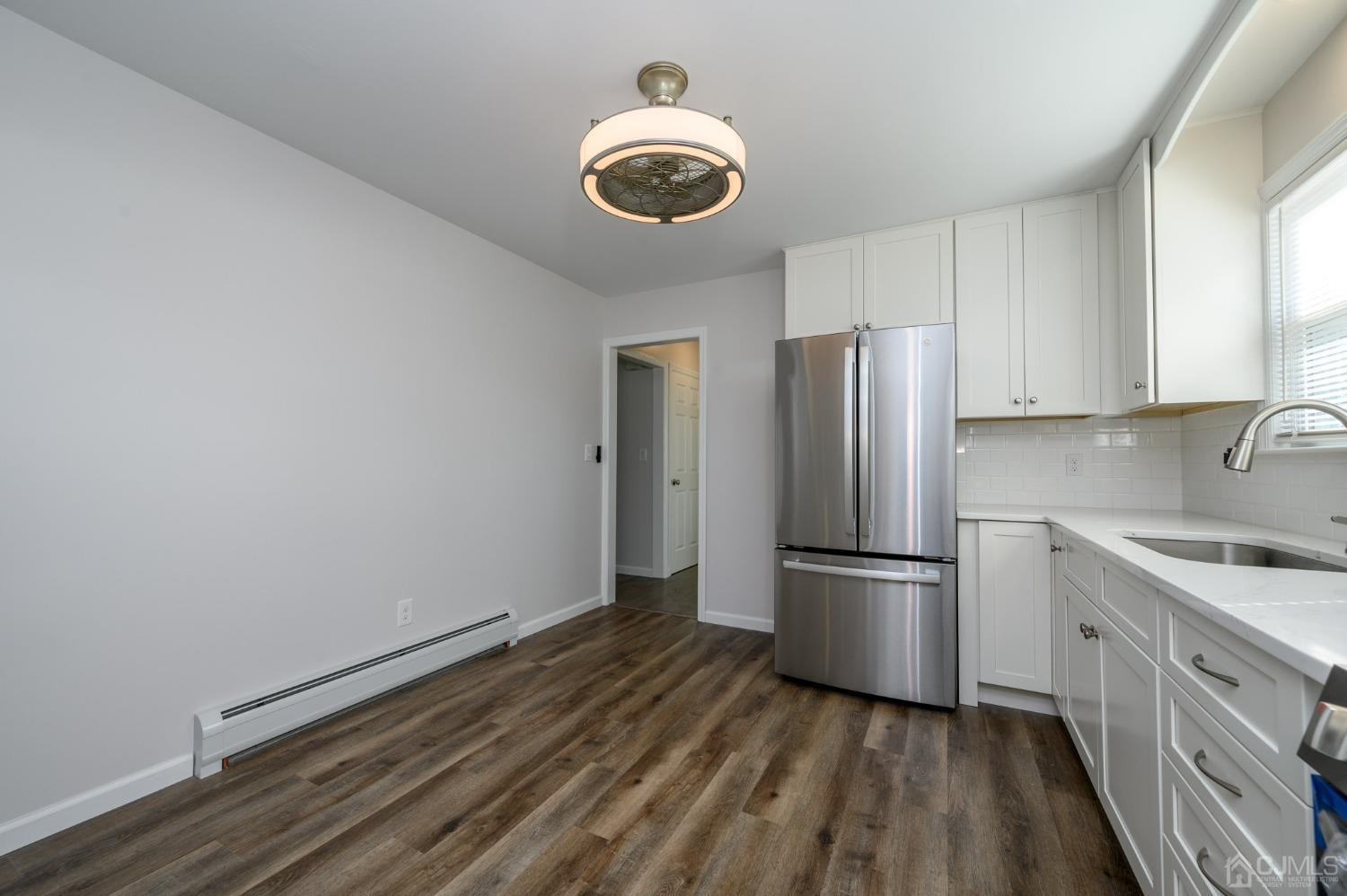16 Green Road Mine Hill, NJ 07803 - Photo 13 of 53 a kitchen with a refrigerator and countertop