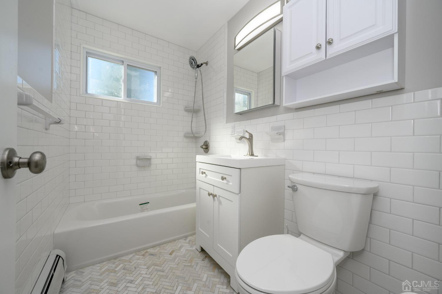16 Green Road Mine Hill, NJ 07803 - Photo 20 of 53 a bathroom with a sink a toilet and bathtub