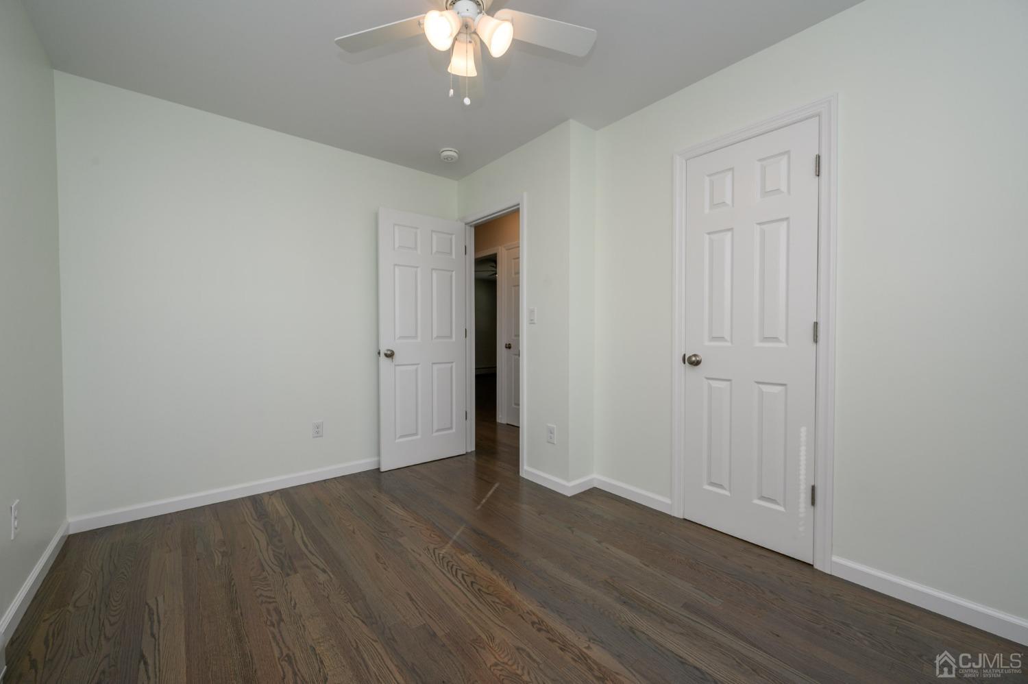 16 Green Road Mine Hill, NJ 07803 - Photo 22 of 53 a view of an empty room with wooden floor