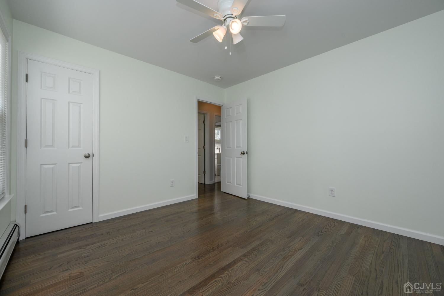 16 Green Road Mine Hill, NJ 07803 - Photo 24 of 53 a view of an empty room with wooden floor