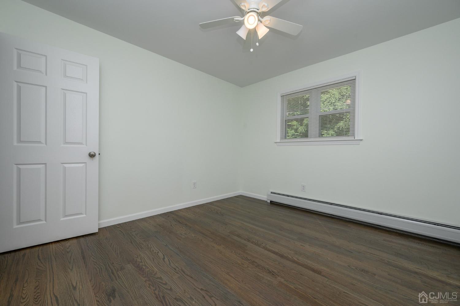 16 Green Road Mine Hill, NJ 07803 - Photo 25 of 53 a view of an empty room with wooden floor