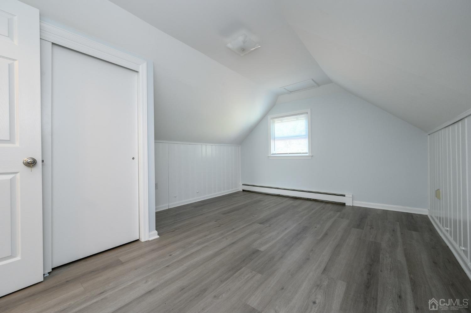 16 Green Road Mine Hill, NJ 07803 - Photo 27 of 53 an empty room with wooden floor and window