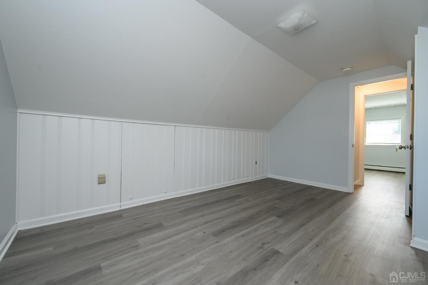 16 Green Road Mine Hill, NJ 07803 - Photo 29 of 53 a view of an empty room and wooden floor