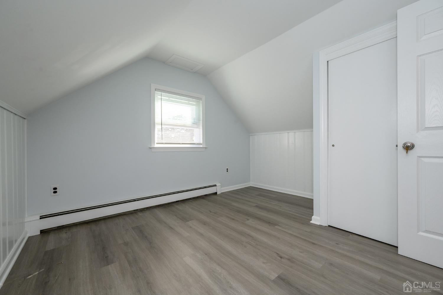 16 Green Road Mine Hill, NJ 07803 - Photo 30 of 53 an empty room with wooden floor and windows