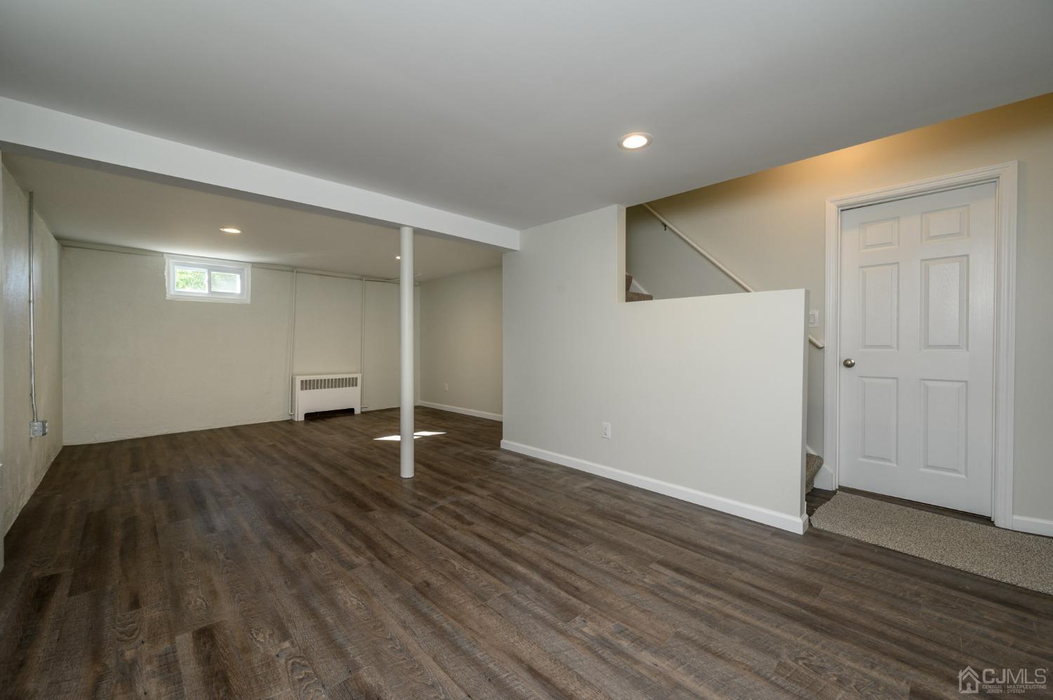 16 Green Road Mine Hill, NJ 07803 - Photo 34 of 53 an empty room with wooden floor and windows