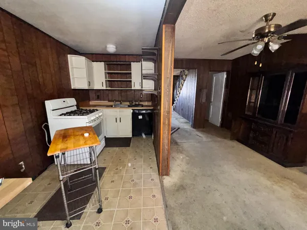 a view of a kitchen with a sink