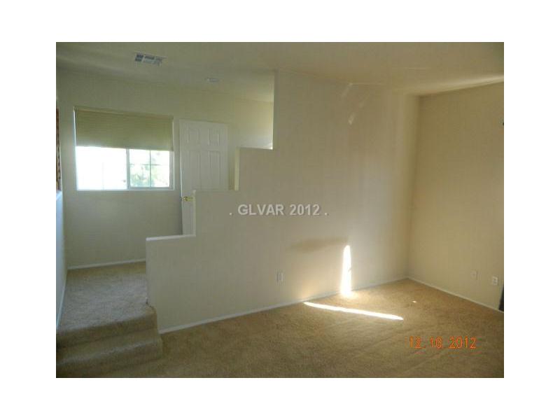 205 Heiple Court Henderson, NV 89052 - Photo 14 of 35 Master Bedroom. SITTING AREA OFF THE MASTER BEDROOM