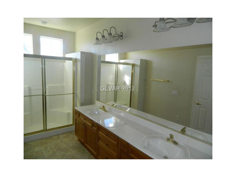 205 Heiple Court Henderson, NV 89052 - Photo 16 of 35 Master Bath/Spa. DOUBLE SINKS AND A LARGE STALL SHOWER IN THE MASTER BATHROOM