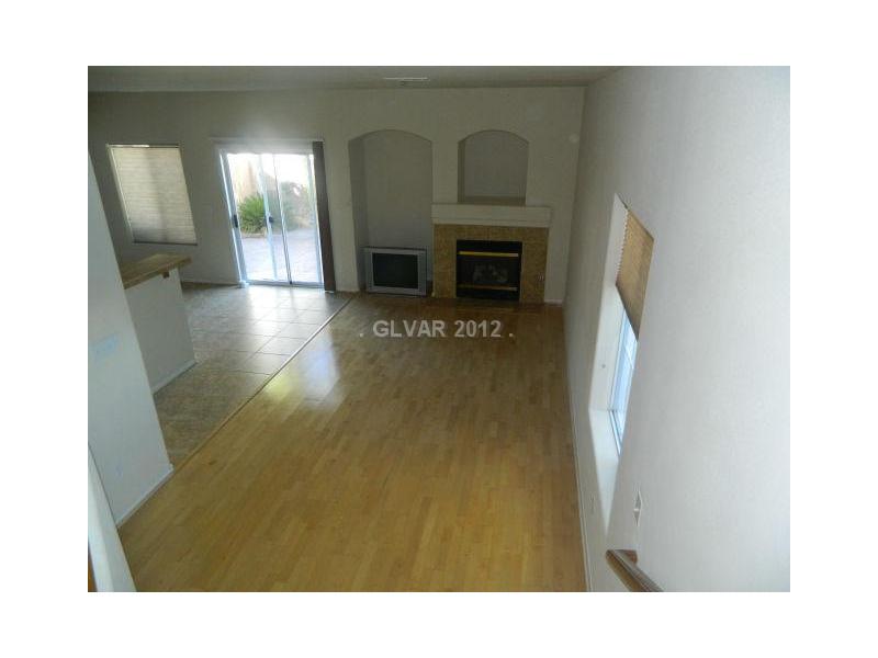 205 Heiple Court Henderson, NV 89052 - Photo 4 of 35 Living Room. VIEW OF LIVING ROOM FROM STAIRS