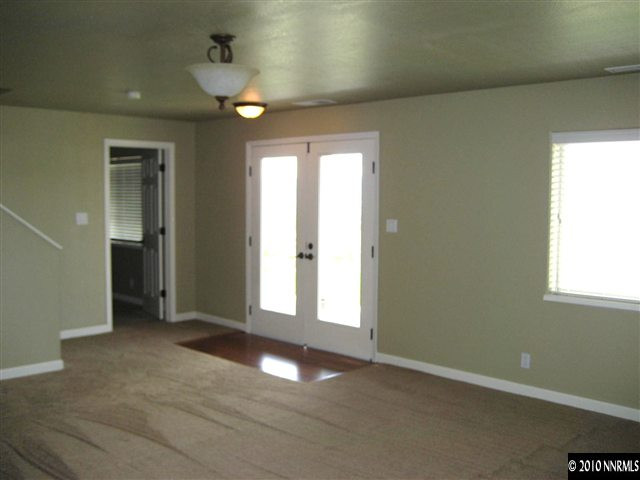 690 Tarn Way Reno, NV 89503 - Photo 10 of 13 an empty room with a empty space and windows
