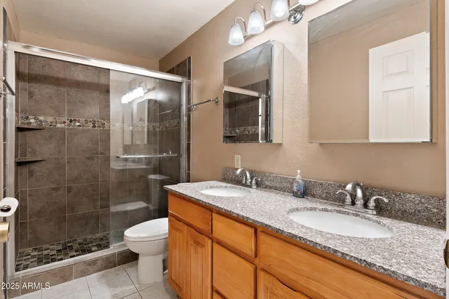 a view of an empty room with windows