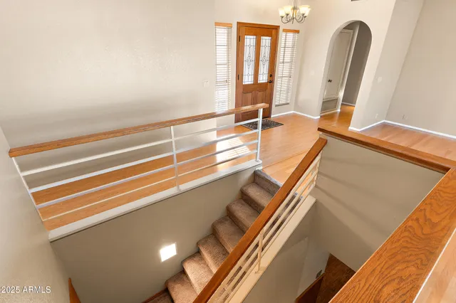 a view of a house with a tree in the background