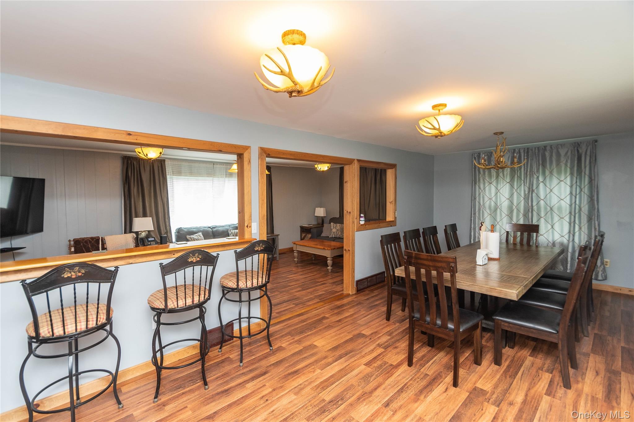 189 Church Street Hancock, NY 13783 - Photo 15 of 47 a view of a dining room with furniture and wooden floor