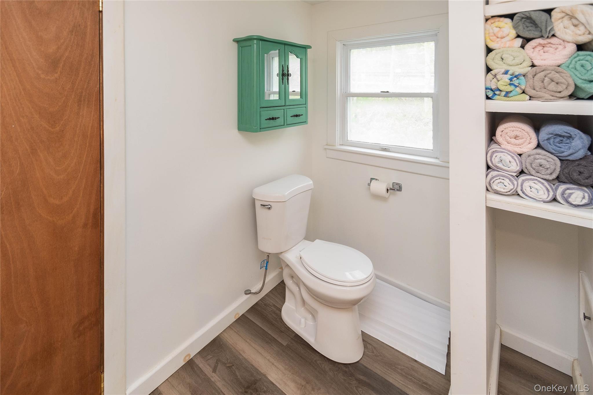 189 Church Street Hancock, NY 13783 - Photo 19 of 47 a white toilet sitting next to a window