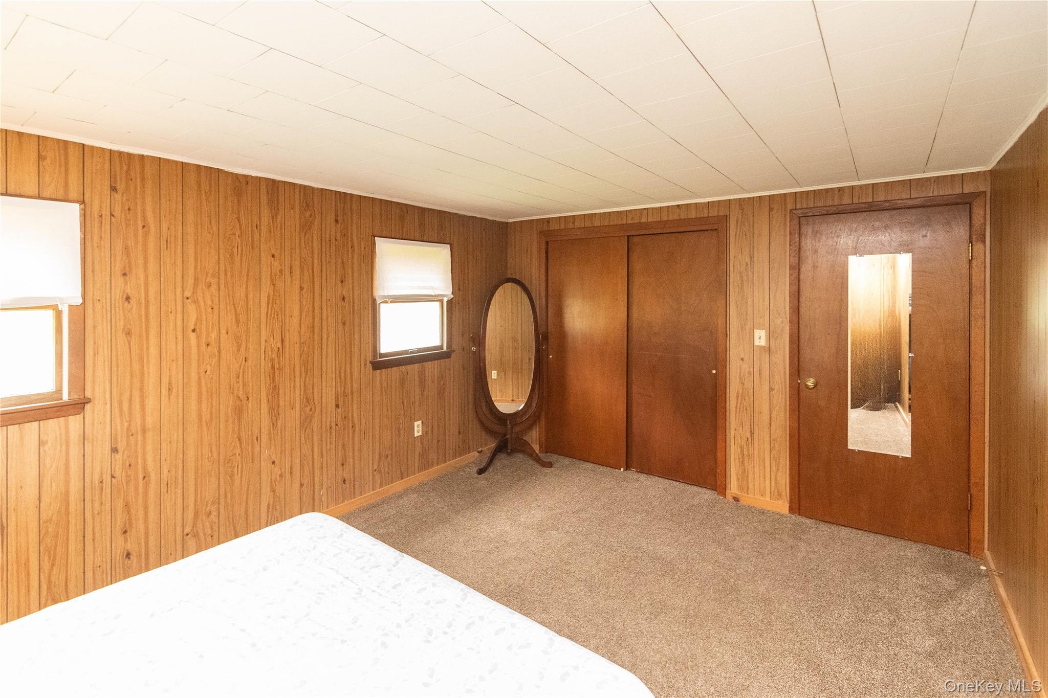 189 Church Street Hancock, NY 13783 - Photo 24 of 47 a view of a room with wooden floor and windows