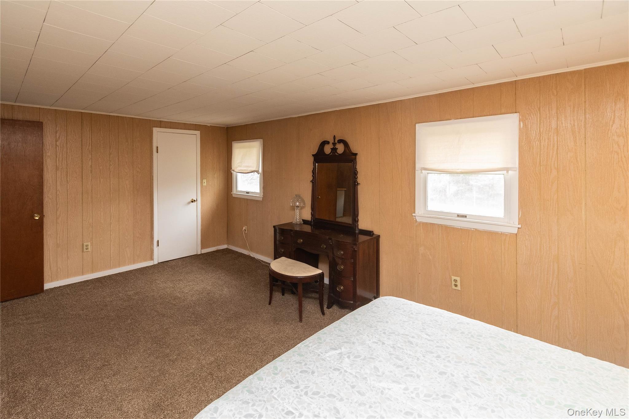 189 Church Street Hancock, NY 13783 - Photo 27 of 47 a room with a bed and a chair
