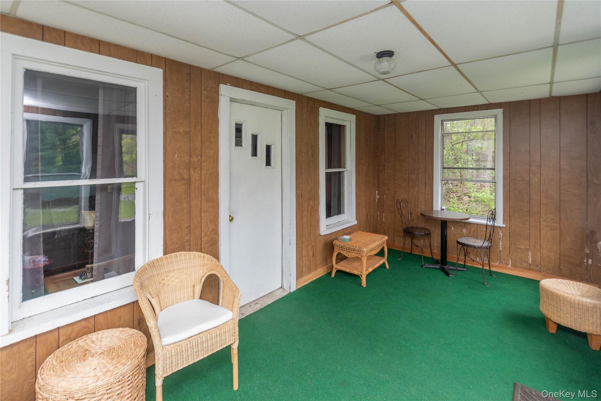 189 Church Street Hancock, NY 13783 - Photo 31 of 47 a living room with furniture and a window
